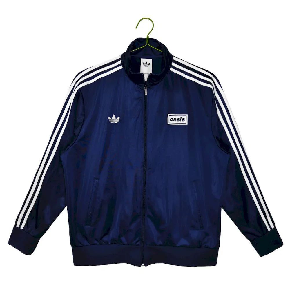 Abrigo Oasis x Adidas 2025