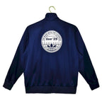 Abrigo Oasis x Adidas 2025