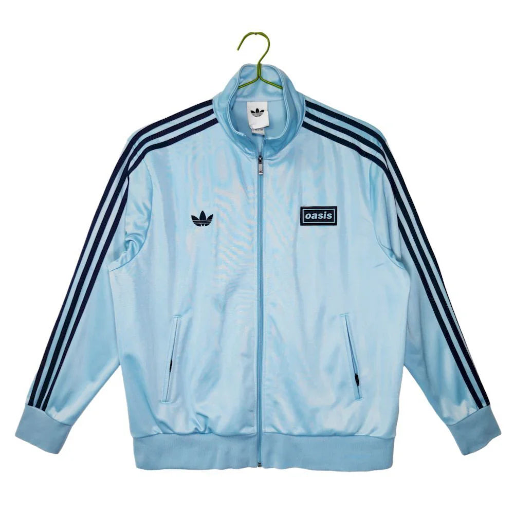 Abrigo Oasis x Adidas 2025