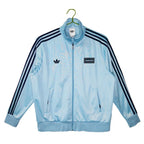 Abrigo Oasis x Adidas 2025