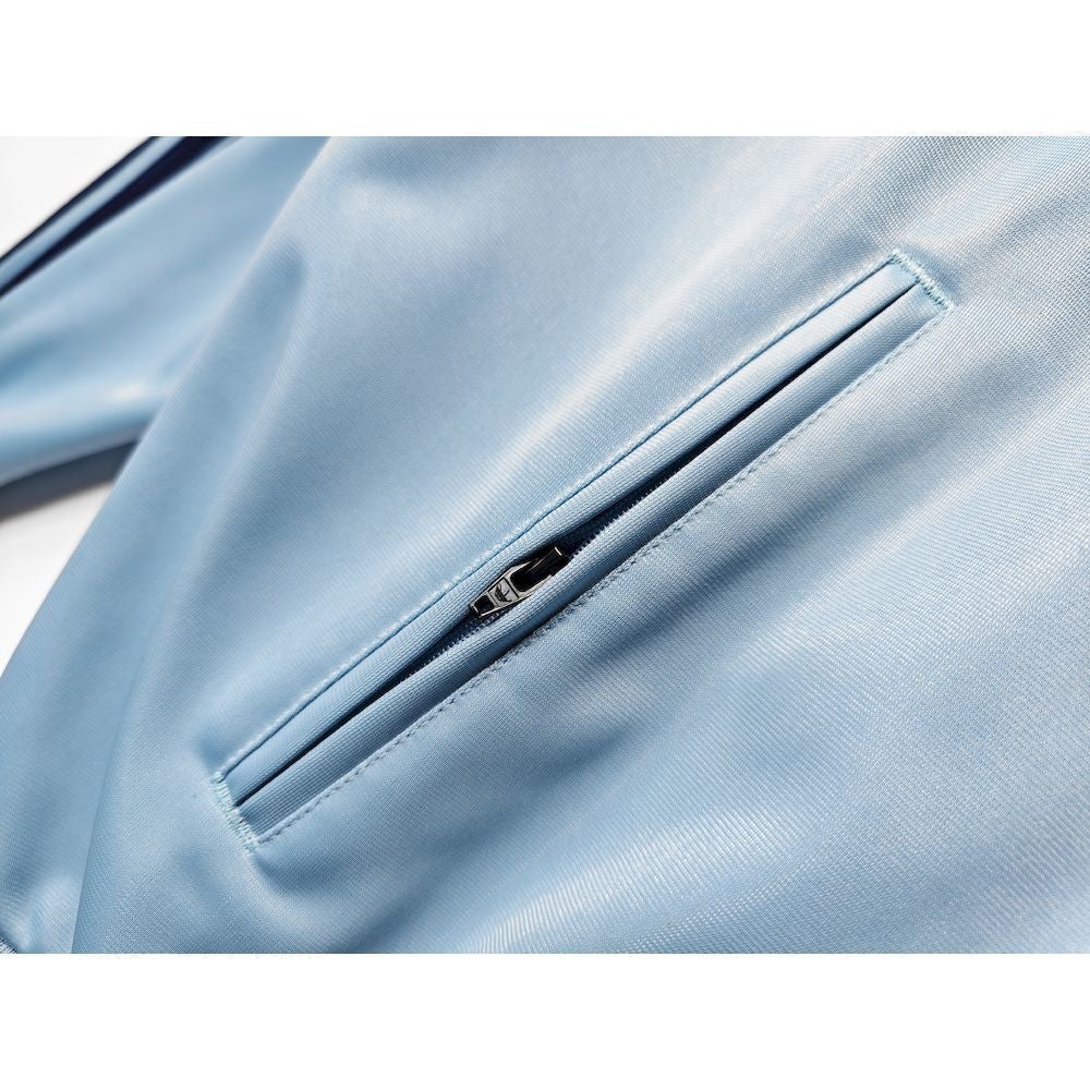 Abrigo Oasis x Adidas 2025