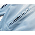 Abrigo Oasis x Adidas 2025